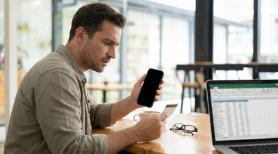 Man reviewing payment methods for a US car hire booking on his phone.
