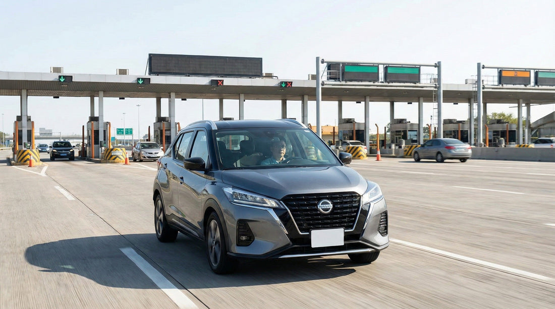 A driver in a grey Nissan Kicks rental car approaching a large, multi-lane toll plaza on a highway near Chicago.
