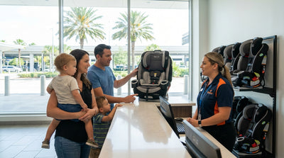 A family with a small child looks worried at a car rental counter in the Orlando airport