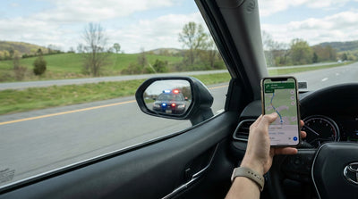 A car rental is pulled over on a Pennsylvania highway by an unmarked police car with flashing lights