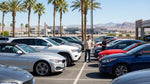 Row of modern vehicles parked at an outdoor car rental lot in Las Vegas