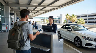A row of cars lined up at the car rental center at Las Vegas Airport on a bright, sunny day