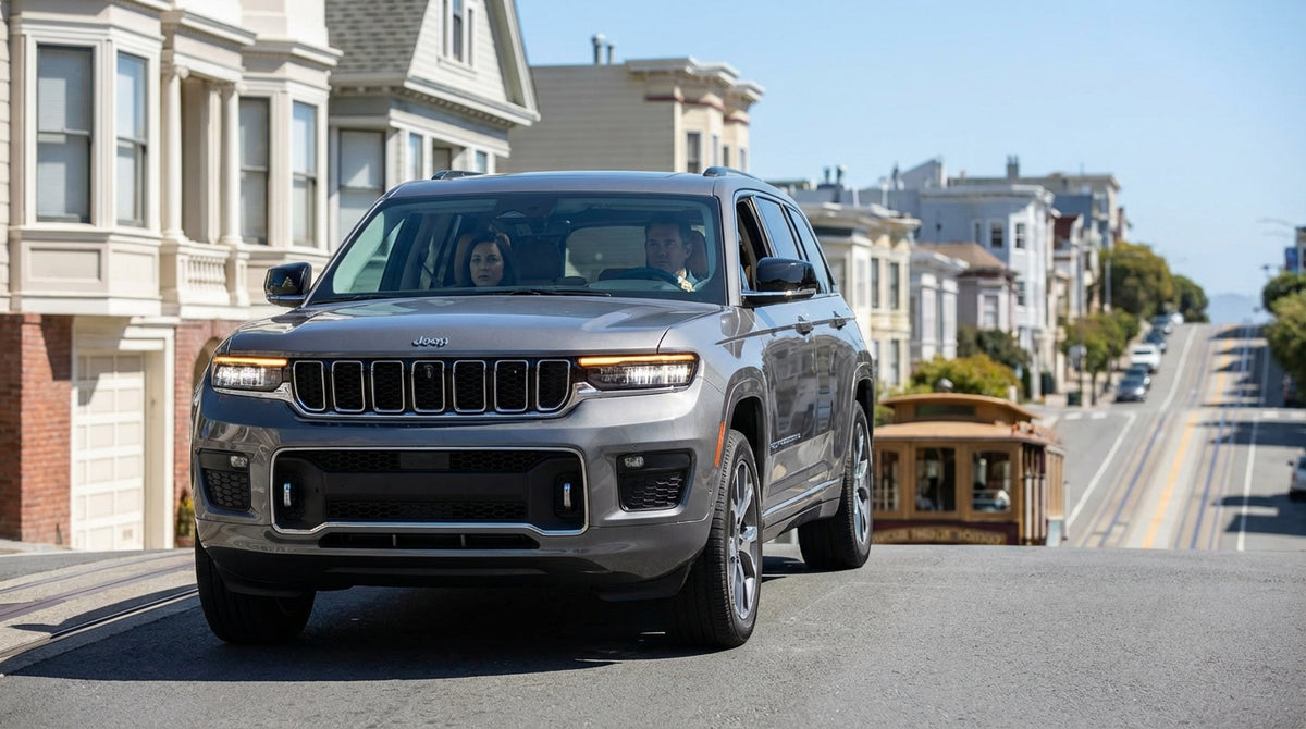 A car hire parked facing uphill on a steep San Francisco street lined with colorful Victorian homes