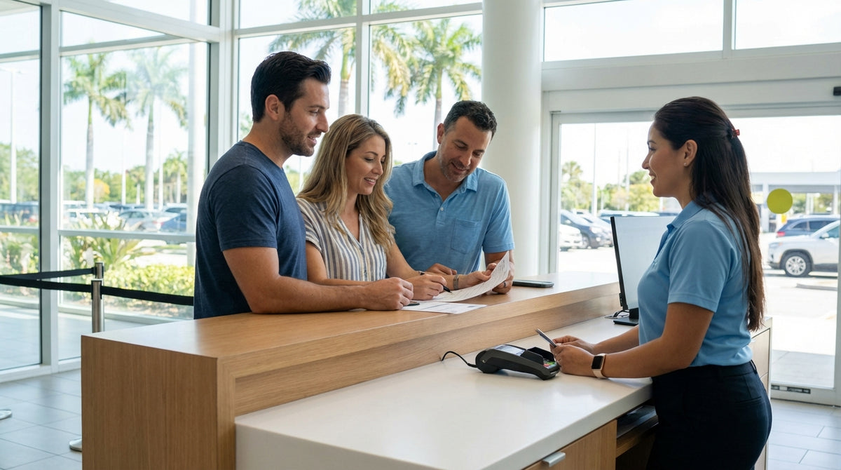 A convertible for car hire parked along a beautiful Florida beach with swaying palm trees