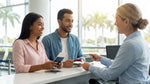 Customer presenting a driving licence to an agent at a car rental desk in Florida