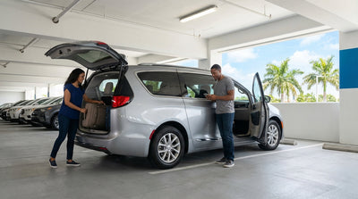 An overhead sign inside Tampa Airport in Florida directing travelers to the car rental pickup area