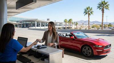Rows of vehicles parked and ready for car hire pickup at the Las Vegas airport on a sunny day