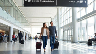 The car rental shuttle bus waits for passengers outside the terminal at Dallas Love Field airport in Texas
