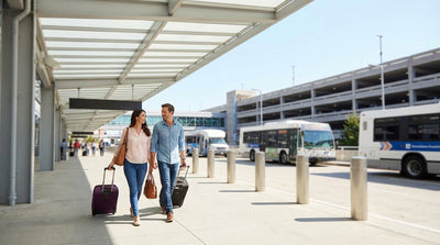 A car rental shuttle bus waits for passengers outside the arrivals terminal at Dallas Love Field in Texas