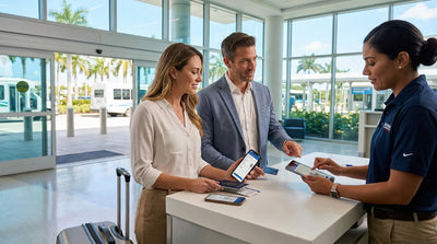 A convertible car rental driving along a sunny, palm-lined coastal road in Florida
