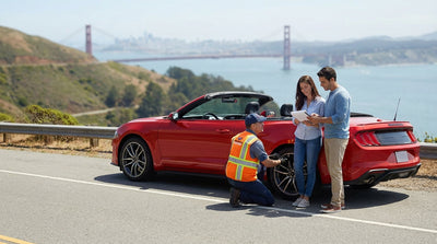 A modern car hire stopped on a scenic viewpoint overlooking the Golden Gate Bridge in San Francisco