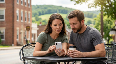 A car hire driving on a scenic road through the rolling green hills of Pennsylvania