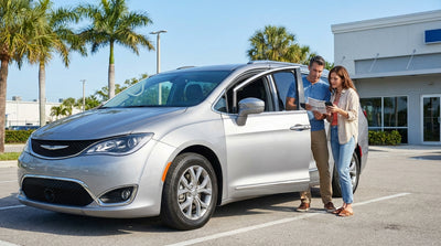 A white convertible car rental driving down a sunny, palm-tree-lined coastal highway in Florida