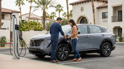 An electric car hire plugged into a charger at a hotel parking lot in California