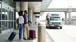 Passengers boarding a car rental shuttle bus outside a LaGuardia terminal in New York