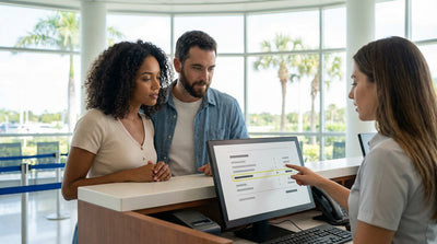 A convertible on a scenic car hire road trip along a palm-tree-lined coastal highway in Florida