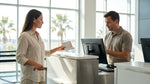 Close up of a person holding a passport and keys at a car rental desk in Miami