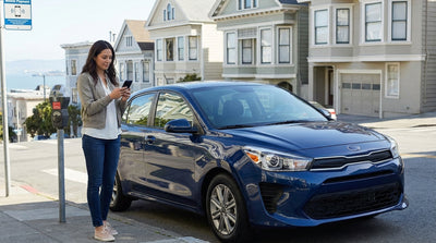 A modern car rental parked on a steep, iconic street in San Francisco with the city skyline in the background