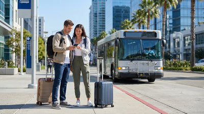 The purple LAX shuttle bus for car rental pick-ups driving past palm trees in sunny Los Angeles
