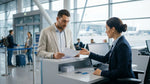 Traveler loading luggage into a vehicle at a car rental lot outside JFK Airport in New York