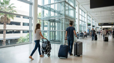 A parent pushes a buggy through the Orlando Airport terminal on their way to the car rental counters with their luggage