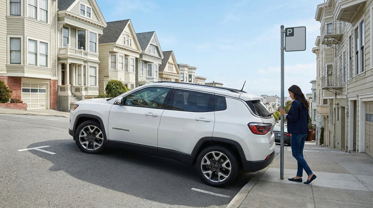 A car hire vehicle parked on a steep San Francisco street with a row of iconic Victorian houses
