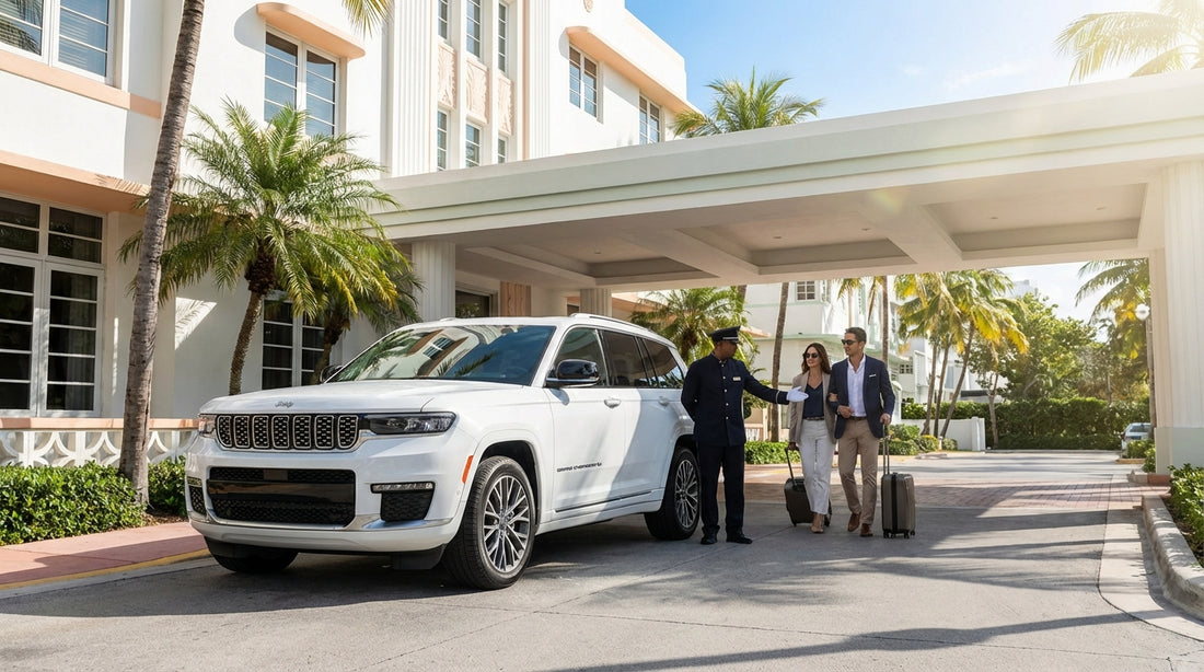 A red convertible car hire parked on Ocean Drive in Miami with palm trees and art deco hotels