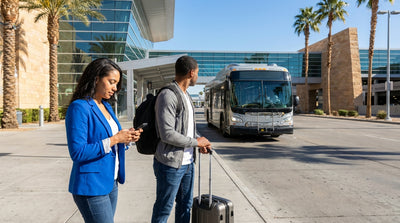 The Las Vegas airport shuttle bus arriving at the curb to pick up car rental customers