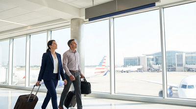 A shuttle bus drops passengers off at the modern car rental center building at the Austin Airport in Texas