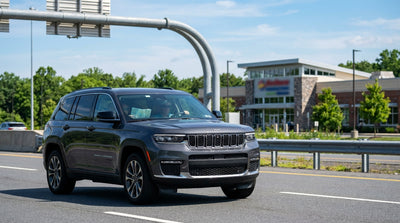 A car hire driving on a highway through the rolling green hills of a scenic Pennsylvania landscape