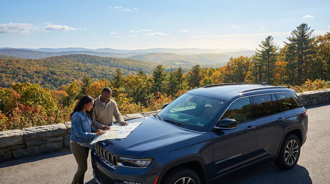 A modern car hire driving a scenic route through the autumn foliage of upstate New York