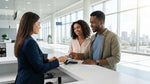 Customer handing a credit card to a clerk at a car hire desk in the United Estates