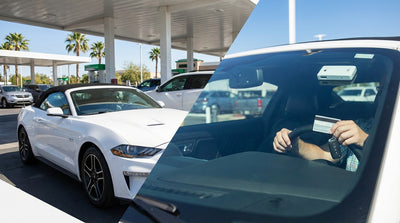 A white car hire drives on a highway under a SunPass toll gantry on a sunny day in Florida
