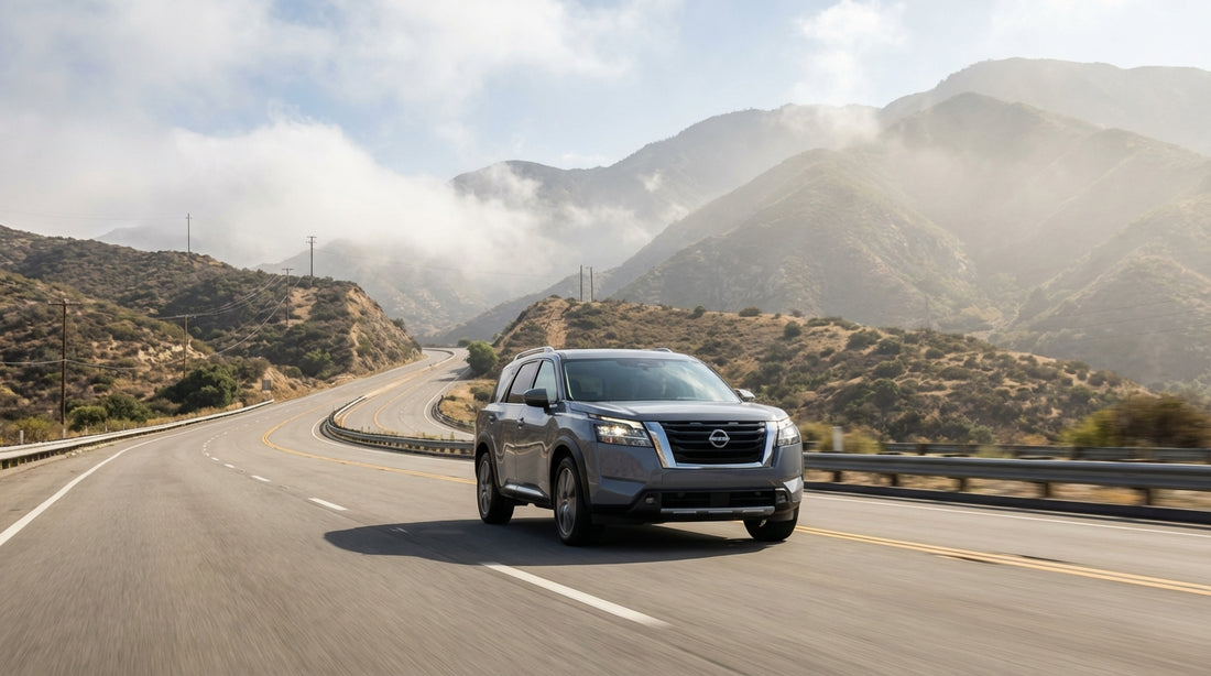 A car hire drives the winding I-5 Grapevine highway through the golden hills of California on a sunny day