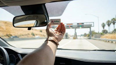 View from inside a car rental of the FasTrak lane on a sunny California freeway