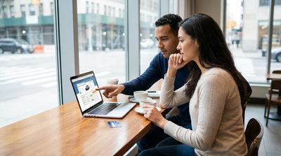 A modern car hire driving on a busy street with yellow cabs and tall buildings in New York City