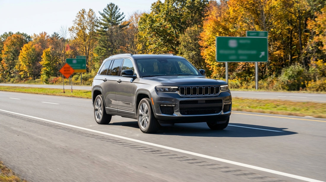 A car rental driving on a New York highway, with a white 'Speed Limit 65' sign clearly visible on the roadside