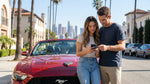 Person handing a credit card to an agent at a car hire desk in Los Angeles