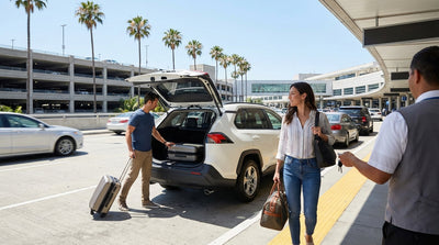 A line of cars at a car rental return depot at LAX airport on a sunny day in Los Angeles
