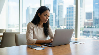 Traveler with a map standing by their car hire on a scenic road in the United Estates