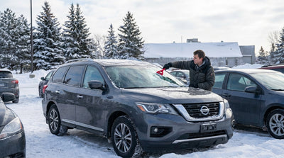 A car rental covered in snow and ice on a cold winter morning in Pennsylvania