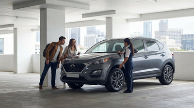 A modern car rental driving through the bustling, bright streets of Times Square in New York