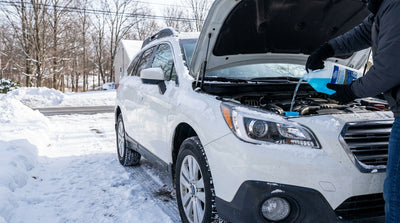 A car hire covered in ice and snow on a cold winter morning in Pennsylvania