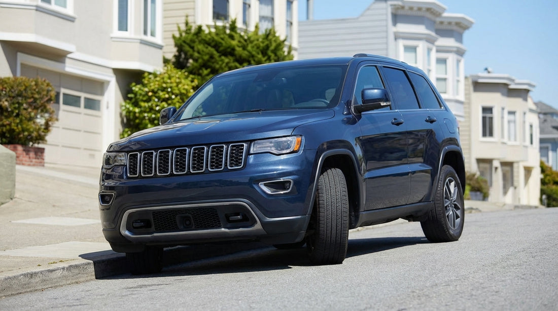 A car hire parked on a steep San Francisco hill, its front wheels angled to the curb in front of Victorian homes