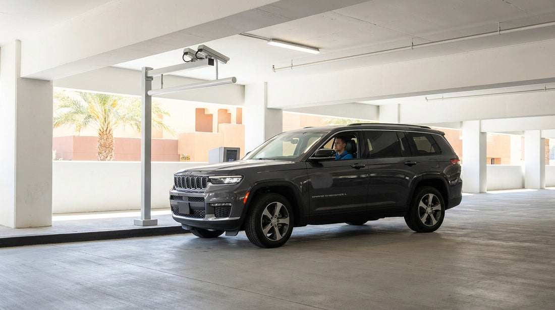 A car hire vehicle driving down the brightly lit Las Vegas Strip at night past famous casino hotels
