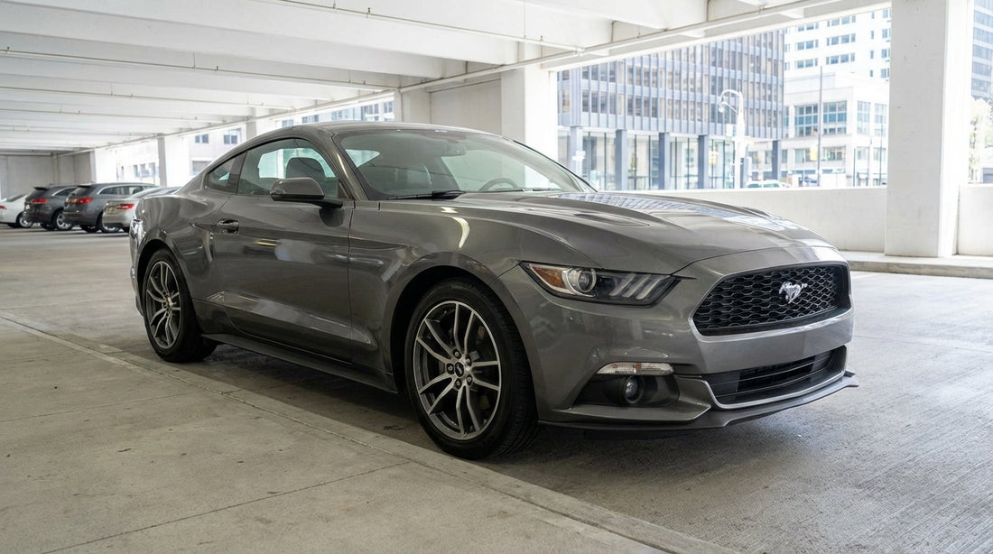 A modern car rental driving across the Brooklyn Bridge with the New York City skyline in the background