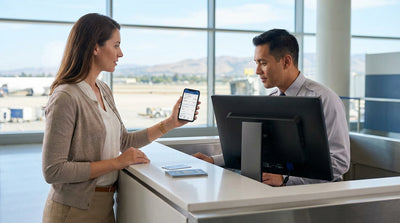 A wide view of the car rental lot at SFO Airport in San Francisco under a clear blue sky