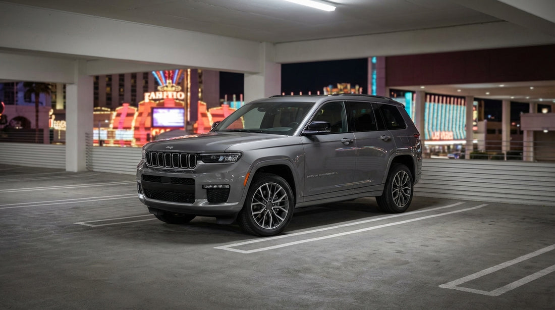 A car hire driving down a neon-lit Fremont Street at night in Las Vegas, surrounded by glowing casino signs