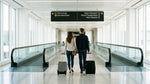 The arrivals hall at Pittsburgh Airport in Pennsylvania with a sign directing travelers to car rental services
