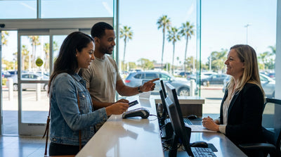 A convertible car hire on a sunny road trip along the scenic coast of California